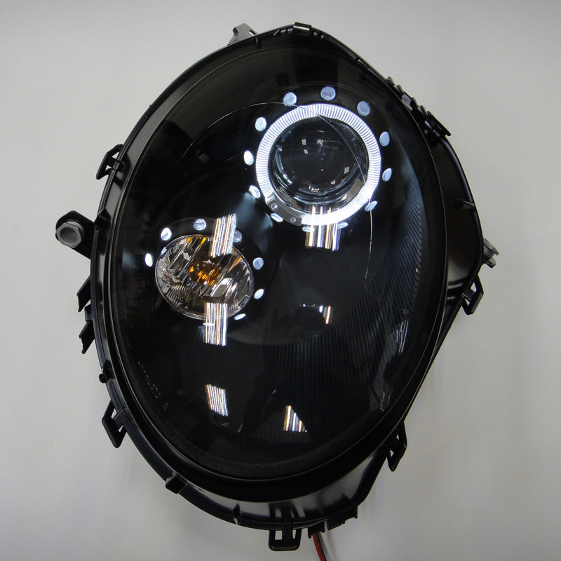 Ajovalot, sopii BMW New Mini R55-R57 2006-2010 - musta - sis. Halos & korkeudensäätömoottori