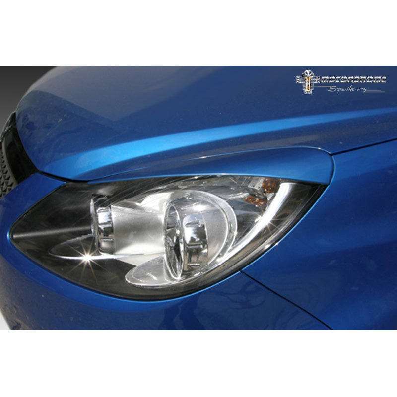 Motordrome, ajovalojen kulmasuojat, sopii Opel Corsa D 2006-2014 (ABS)