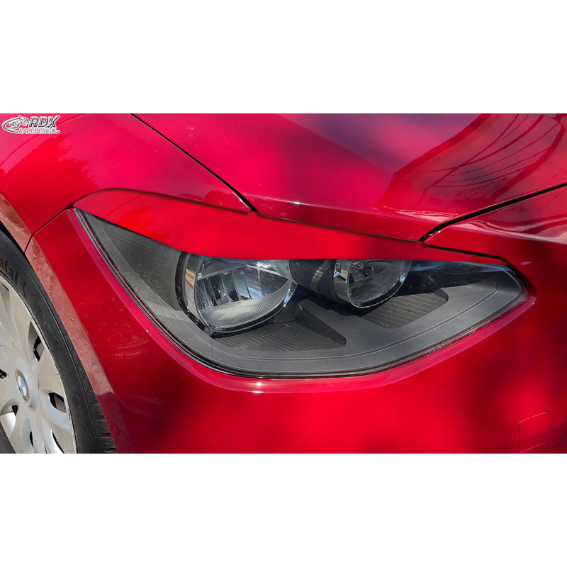 RDX Racedesign, ajovalojen kulmasuojat, sopii BMW 1-Series F20/F21 3/5-ovinen 2010-2015 (vain halogeeniversioihin) (ABS)