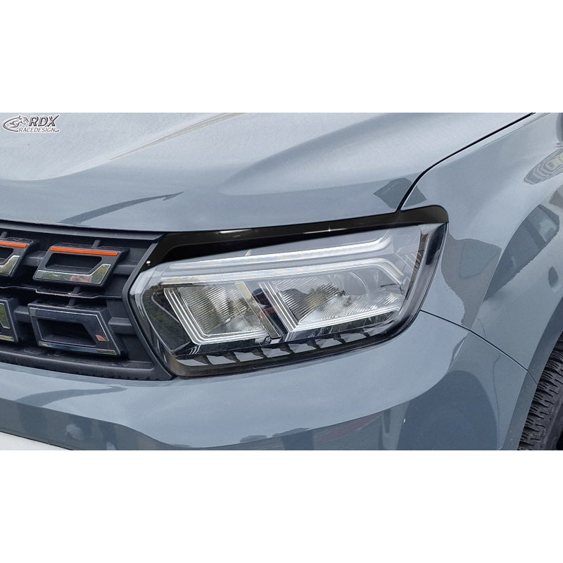 RDX, Ajovalon kulmasuoja, ABS kiiltävä musta, sopii Dacia Duster II:een (2018-2024)