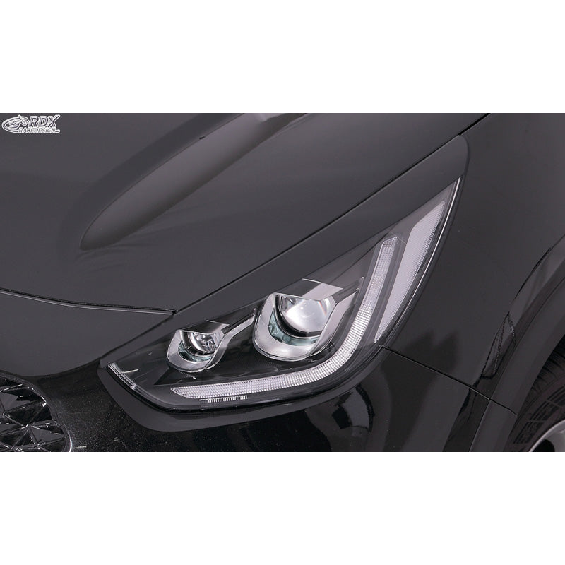 RDX Racedesign, ajovalojen kulmakarvat, sopii Kia Niro, e-Niro & Niro Plus (vain LED-ajovaloilla) 2016-2022 (ABS)